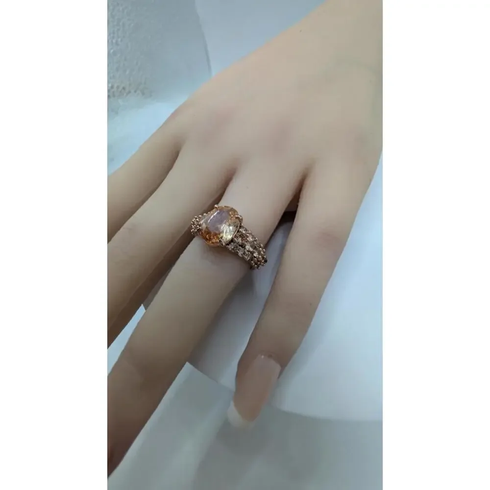 Rose Gold Tone Ring with Central Gem and Accent Stones Size 6